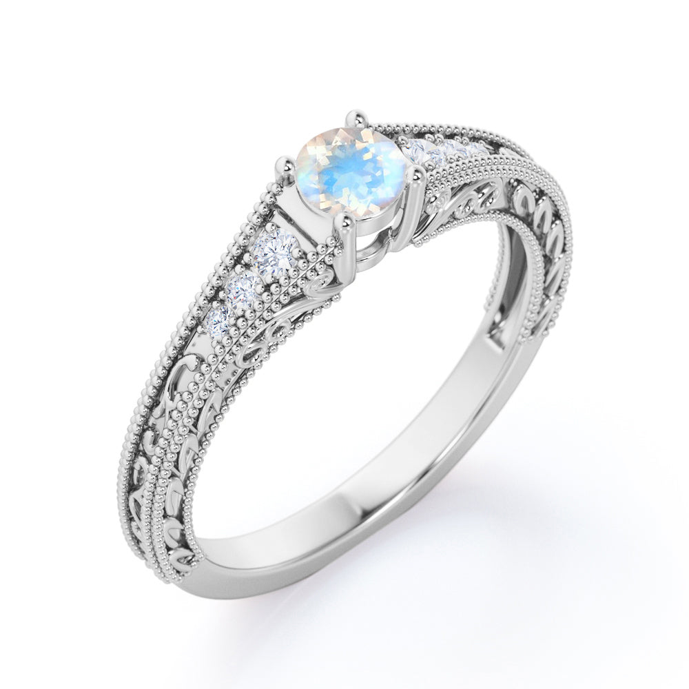 Exquisite Double Beaded 0.6 carat Round cut Moonstone and diamond filigree style engagement ring in White gold