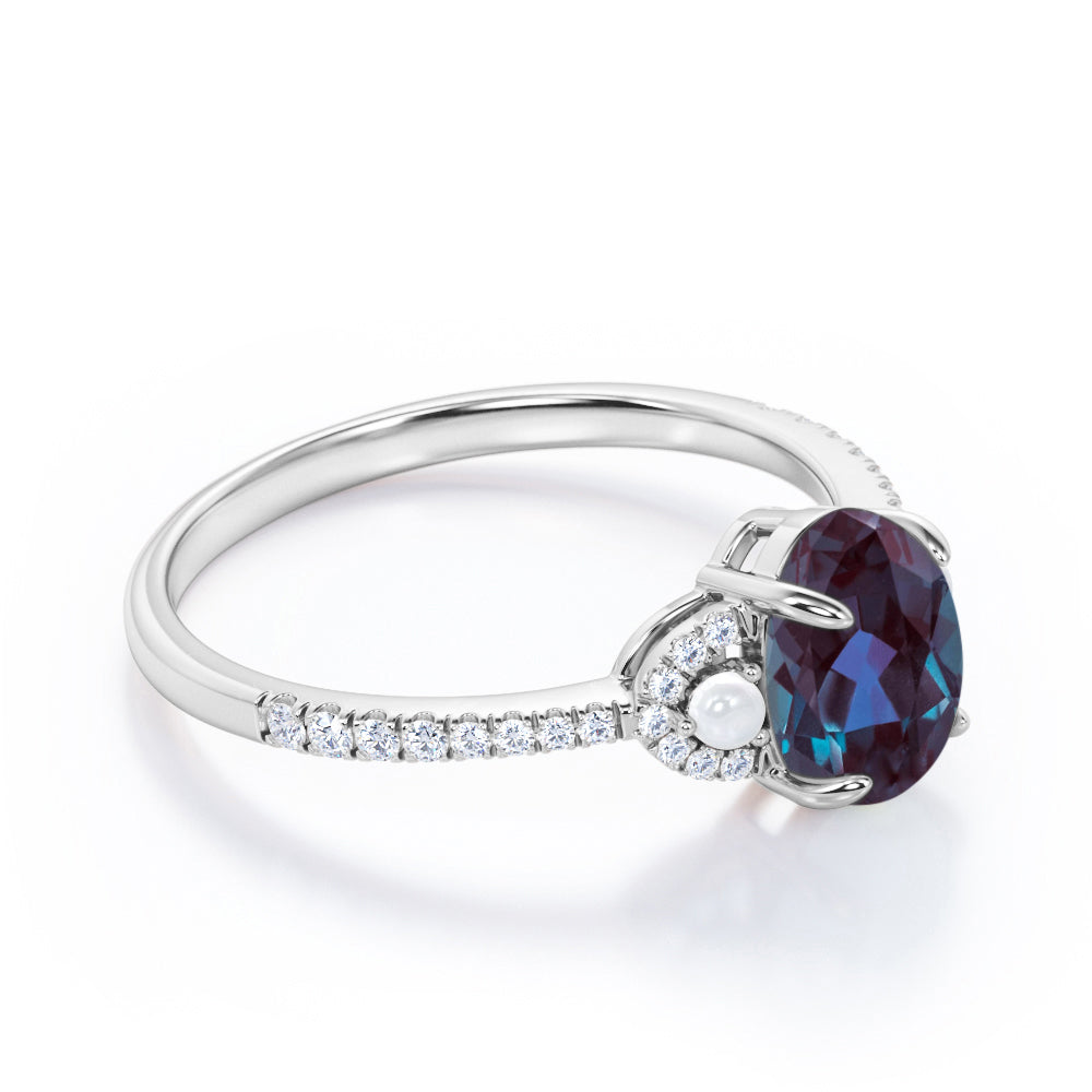 Crescent bands 1.5 carat Oval shaped Synthetic Alexandrite, diamonds and pearl engagement ring in White gold