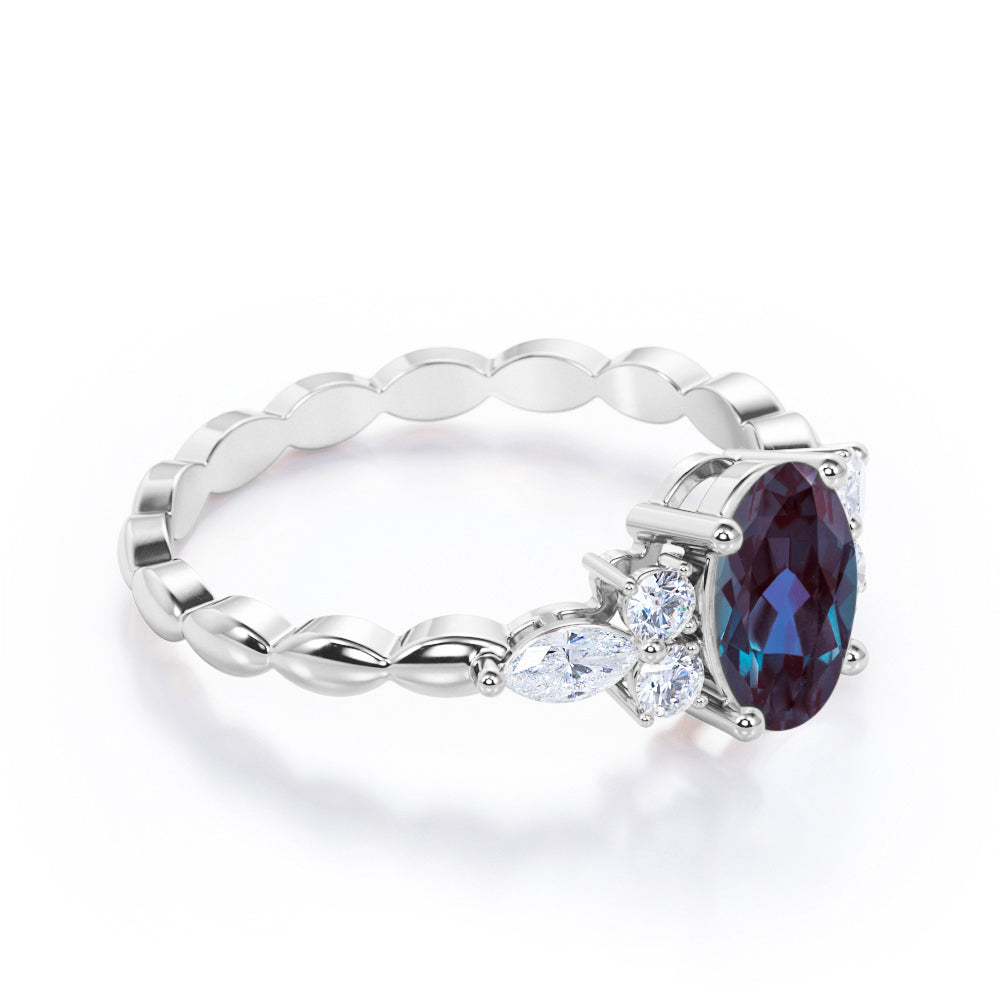Scalloped bands 1.1 carat Oval cut Lab made Alexandrite and diamond prong style setting engagement ring in White gold