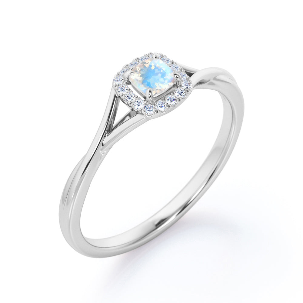 Minimal Twist Shank 0.75 carat Cushion Cut Blue Moonstone and diamond floral halo engagement ring in White gold