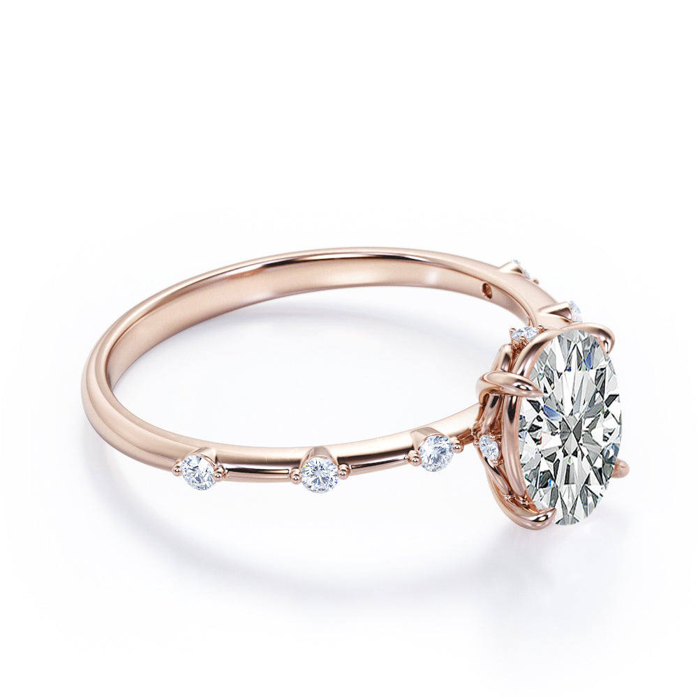 Delicate twig 1 carat Oval shaped Moissanite and diamond 7 stone engagement ring for her in rose gold