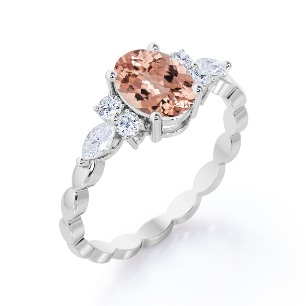 Twisted Bands 1.15 carat Oval shaped Peach Morganite and diamond flower style engagement ring in White gold