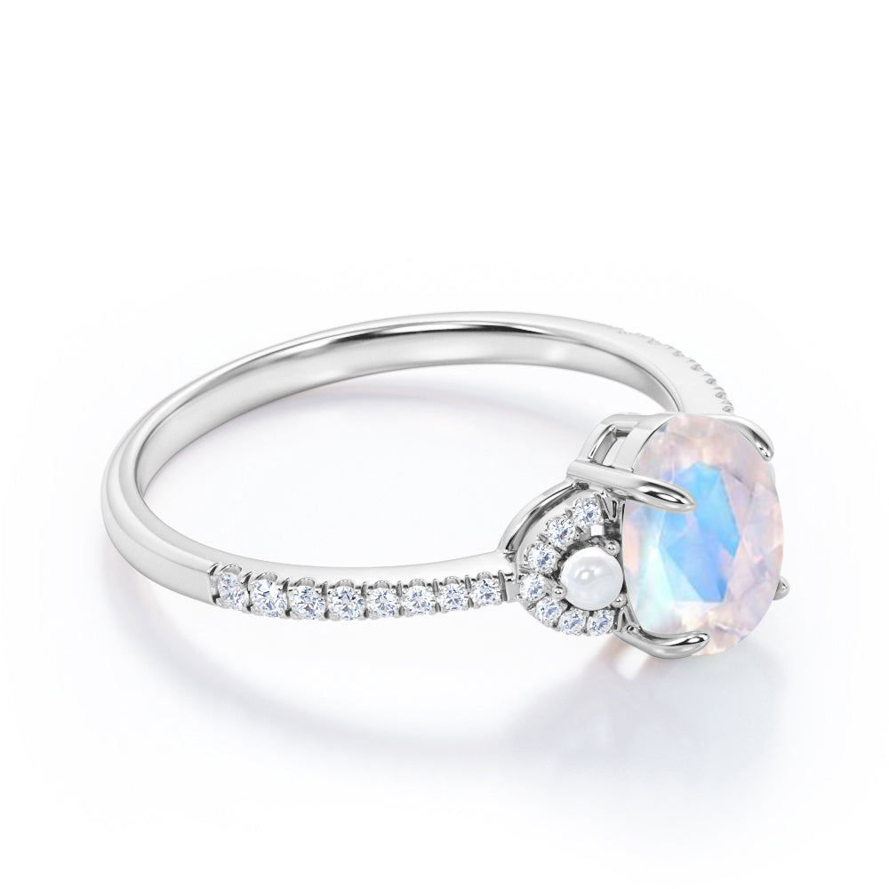 Pretty Pearls 1.5 carat Oval cut Moonstone and diamond traditional engagement ring in White gold