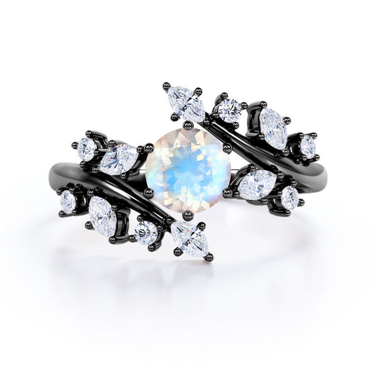 Floral Branch and leaf 1.25 carat Round cut Blue Moonstone and diamond tension set engagement ring in Black gold