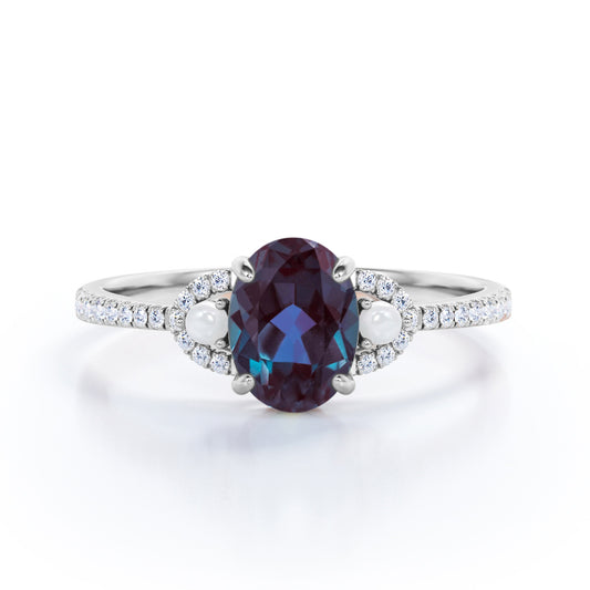 Crescent bands 1.5 carat Oval shaped Synthetic Alexandrite, diamonds and pearl engagement ring in White gold