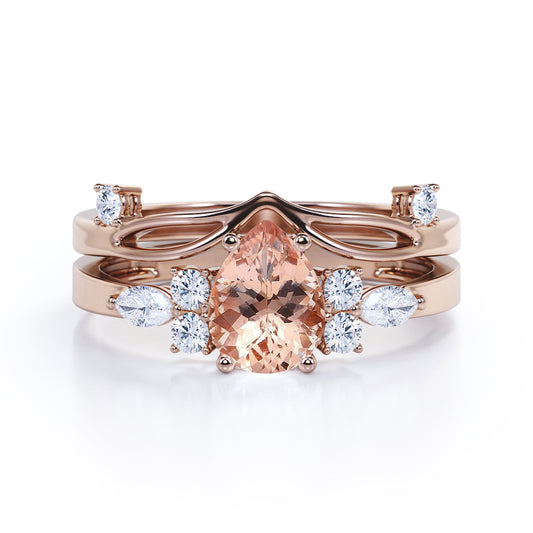 Magnificent Split Shank 1.25 carat Pear shaped Morganite and diamond chevron wedding ring set in Rose gold