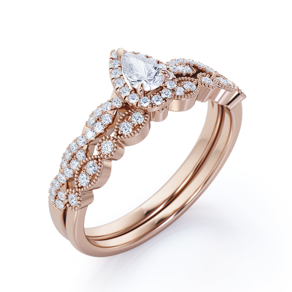 Vintage infinity 1.25 carat Pear shaped Moissanite and diamond milgrain and halo Bridal set in Rose gold