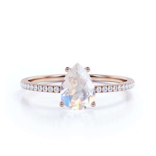 Affordable 1.25 carat Pear shaped Moonstone and diamond half-eternity engagement ring in Rose gold