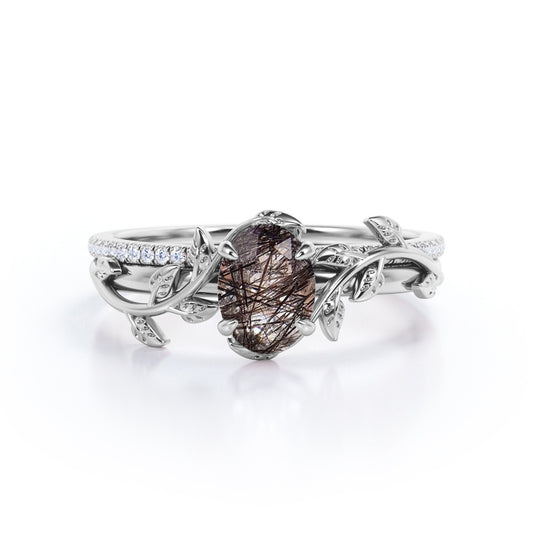 Stylish floral patterns 1.25 carat Oval cut Black Brown Rutilated quartz and pave diamond nature inspired wedding ring set for her in White gold
