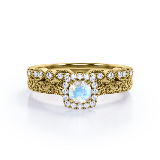 Antique Filigree and Milgrain 1.5 carat Round cut Moonstone and diamond square halo engagement ring in yellow gold