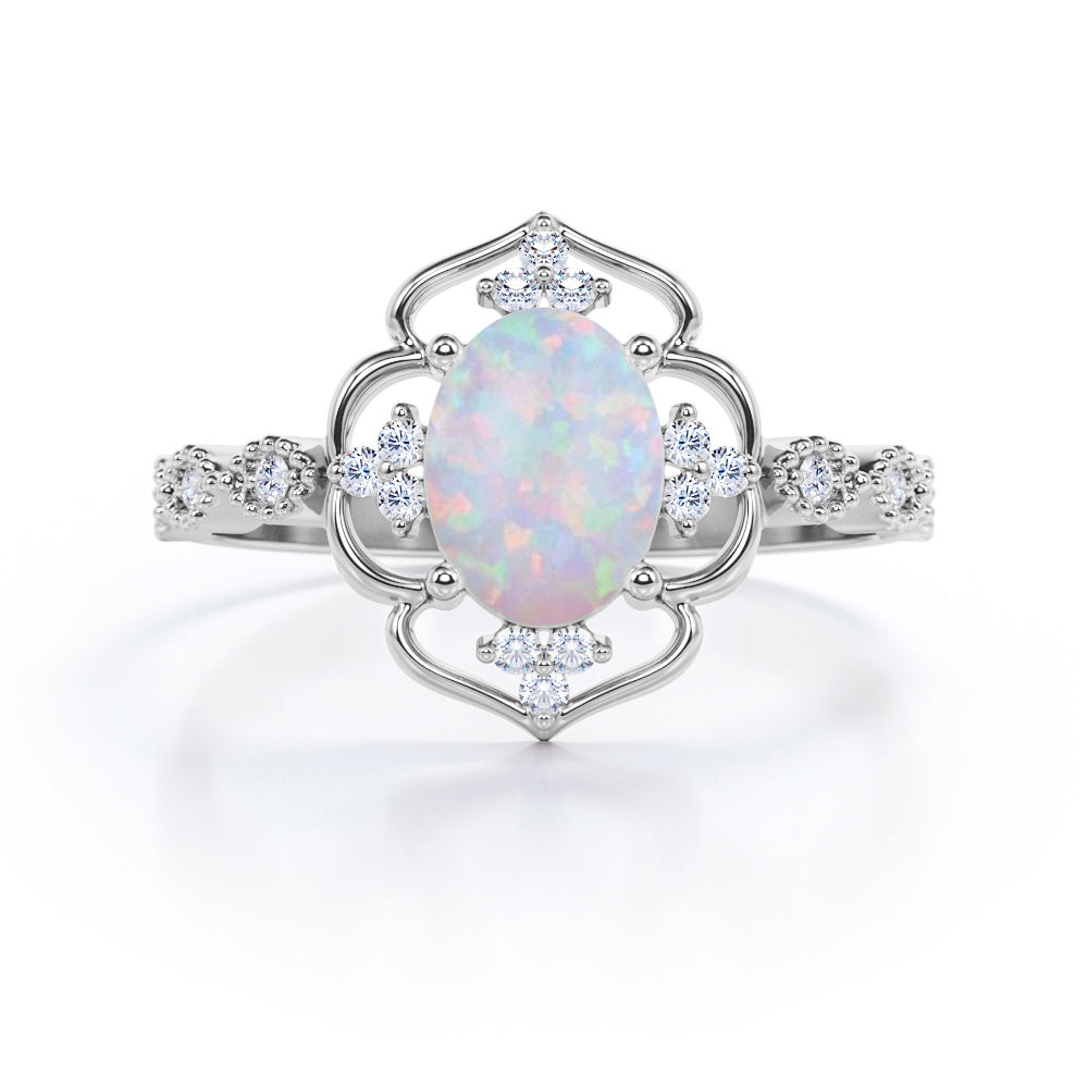 Intricate halo 1.15 carat Oval cut Ethiopian Opal and diamond Milgrain engagement ring in White gold