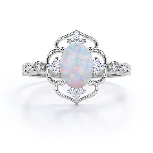 Intricate halo 1.15 carat Oval cut Ethiopian Opal and diamond Milgrain engagement ring in White gold