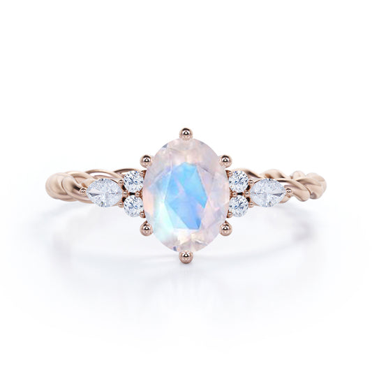Vintage Braided 1.1 carat Oval cut Rainbow Moonstone and diamond infinity style engagement ring in Rose gold