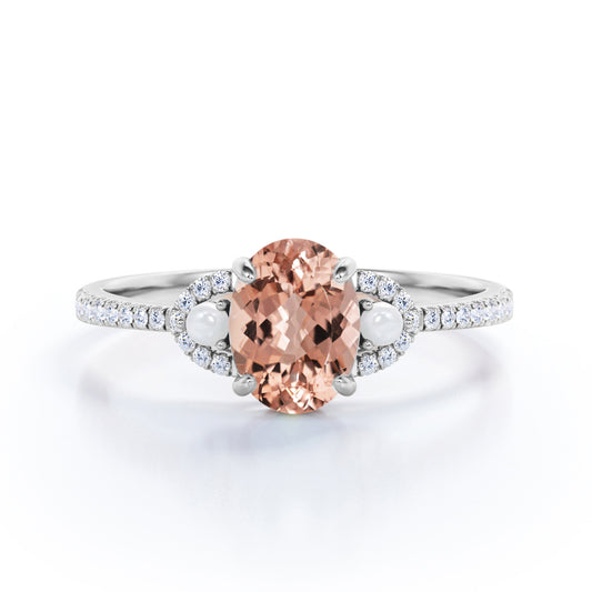 Art Nouveau inspired 1.5 carat Oval cut Morganite, diamond and pearl engagement ring in White gold