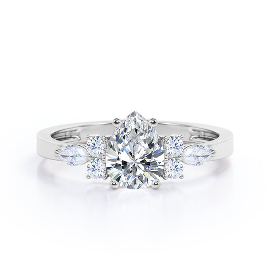 Elegant Beveled Edge 1.15 carat Pear cut Moissanite and diamond engagement ring in White gold