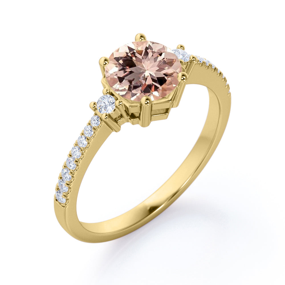 Asymmetric Bezel 1.25 carat Round cut Peach Morganite and diamond eternity style three stone wedding ring set in Yellow gold