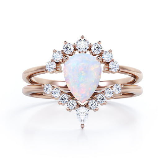 Royal Crown inspired 1.15 carat Pear cut Opal and diamond chevron wedding ring set for women in Rose gold