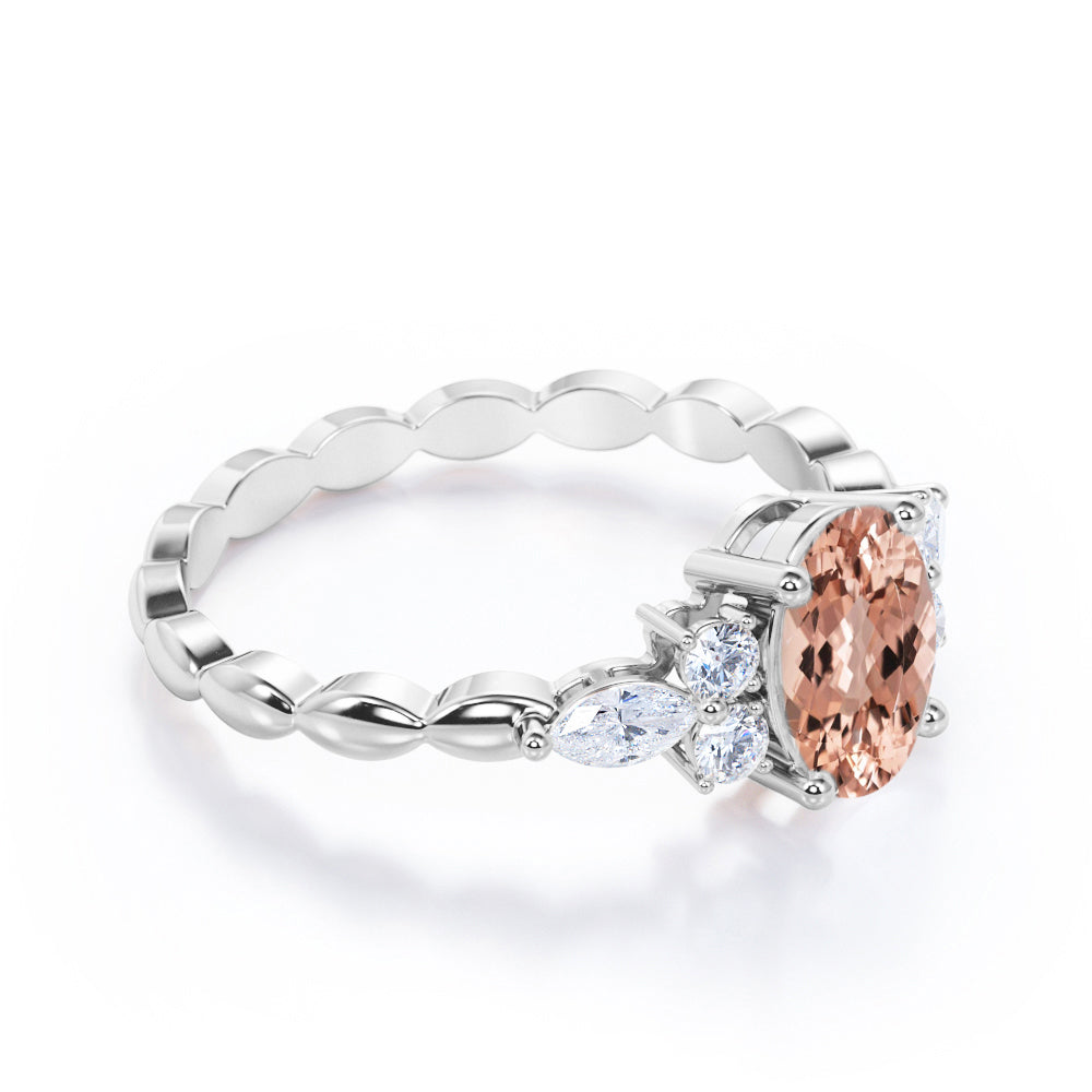 Twisted Bands 1.15 carat Oval shaped Peach Morganite and diamond flower style engagement ring in White gold