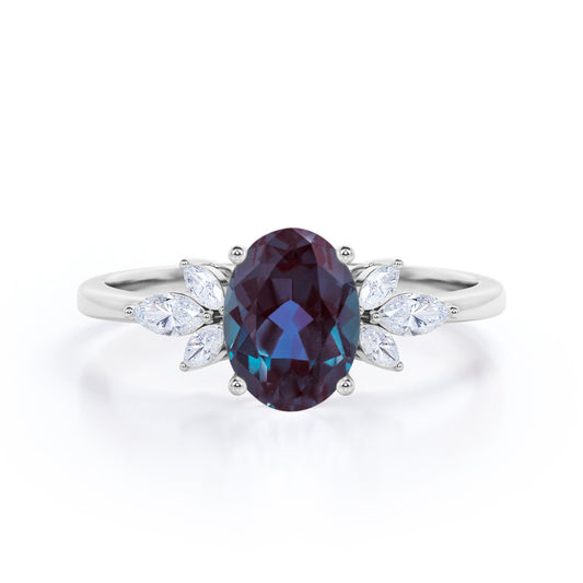 Artistic Flower patterns 1.1 carat Oval shaped Alexandrite and diamond marquise engagement ring in White gold
