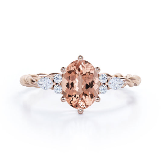 Modern twisted rope design 1.15 carat Oval cut Morganite and diamond infinity prong engagement ring in Rose gold