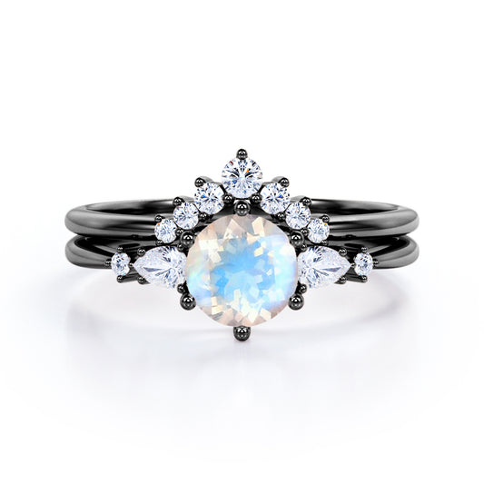 Antique Chevron 1.4 carat Round cut Blue Moonstone and diamond tapered style Bridal set for women in Black gold
