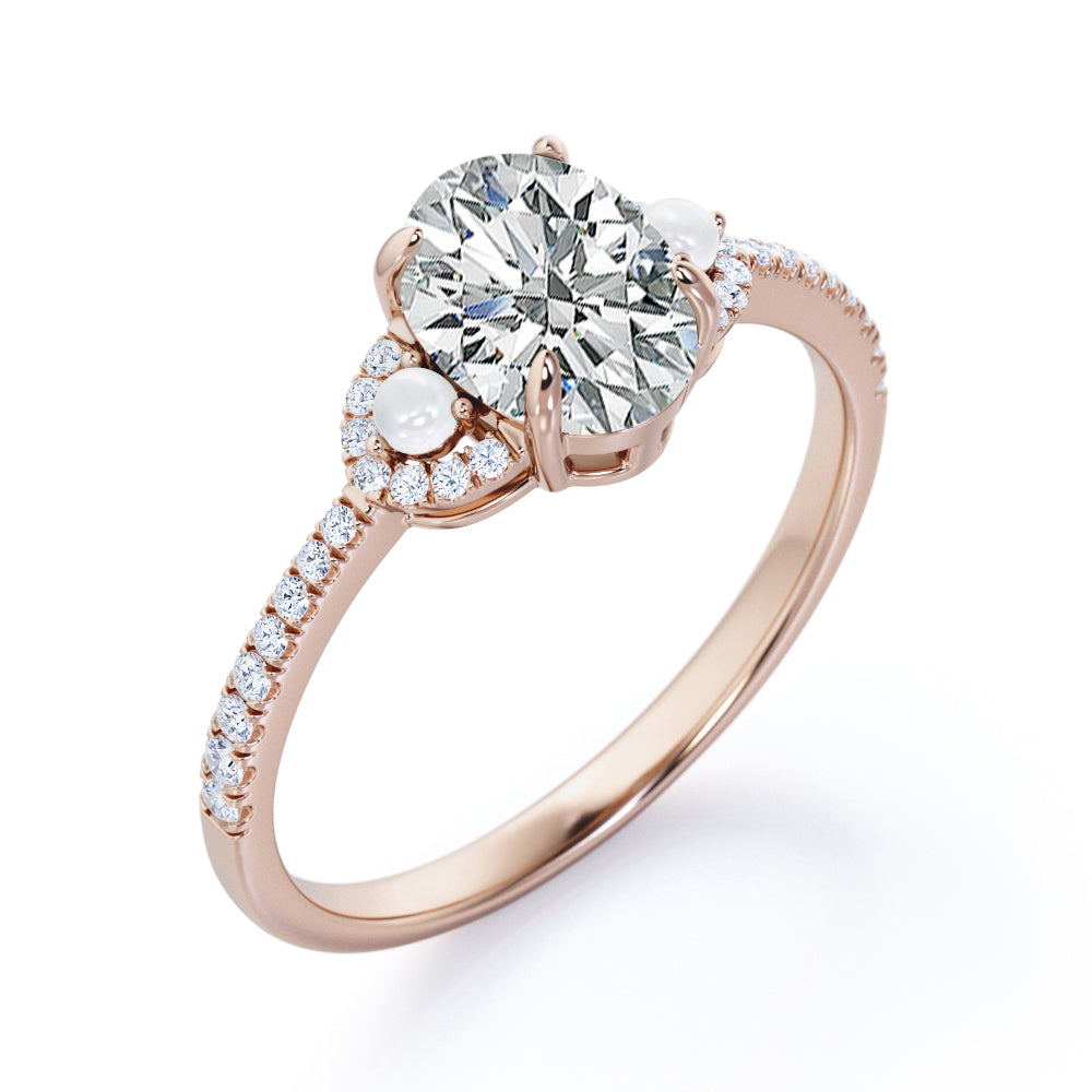 Vintage crescent style 1.35 carat Oval cut Moissanite, diamonds and freshwater pearl engagement ring in Rose gold