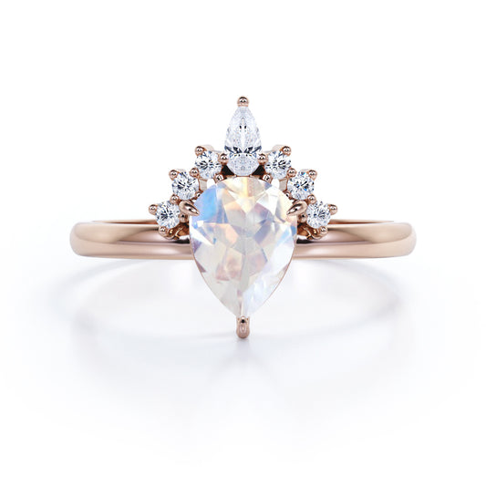 Crown Tiara inspired 1.2 carat Pear cut Rainbow Moonstone and diamond prong style engagement ring in Rose gold