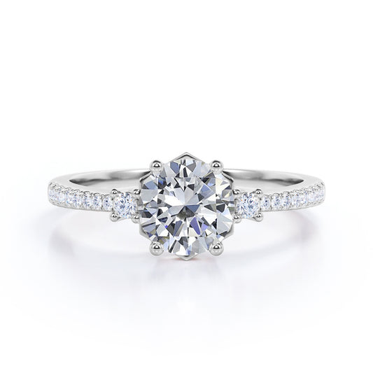 Antique Pave set 1.25 carat Round cut Moissanite and diamond 3 stone engagement ring in White gold