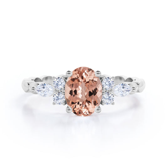 Twisted Bands 1.15 carat Oval shaped Peach Morganite and diamond flower style engagement ring in White gold