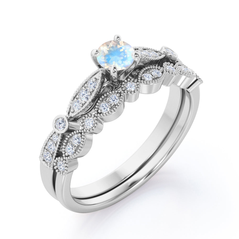 Double Milgrain 1.5 carat Round cut Rainbow Moonstone and diamond cathedral pave engagement ring in White gold