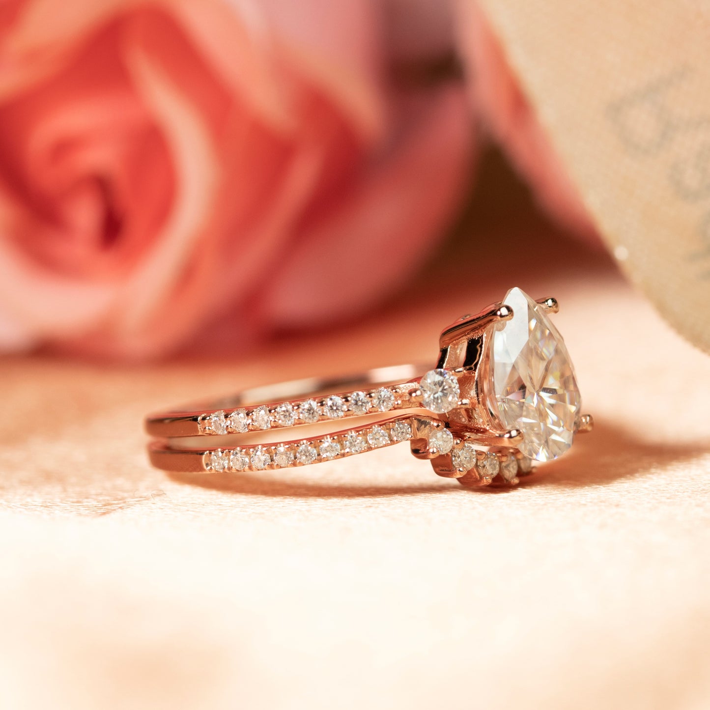 Timeless 1.4 carat Tear Drop Cut Moissanite Nesting Wedding Ring Set in Rose Gold