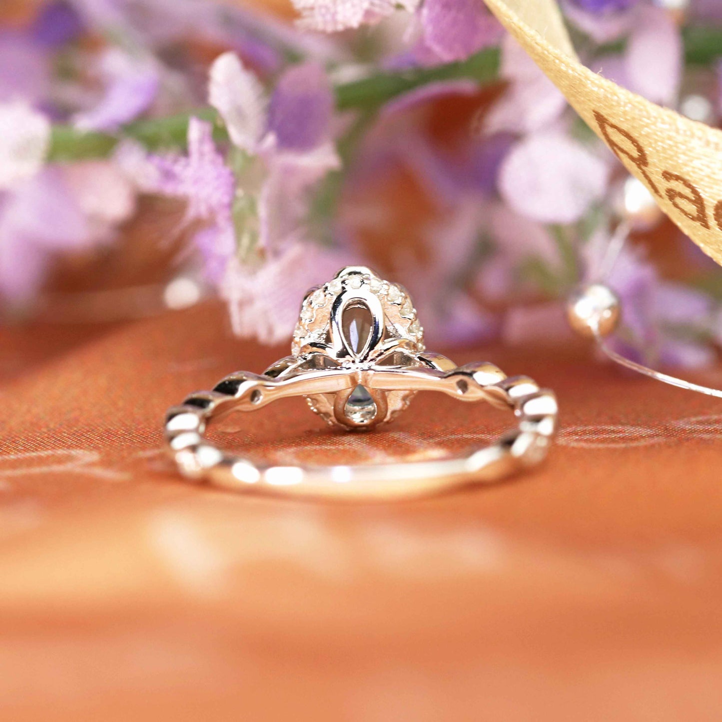Unique 1.1 carat Oval Shaped Alexandrite and Diamond Halo Scalloped Engagement Ring in White Gold