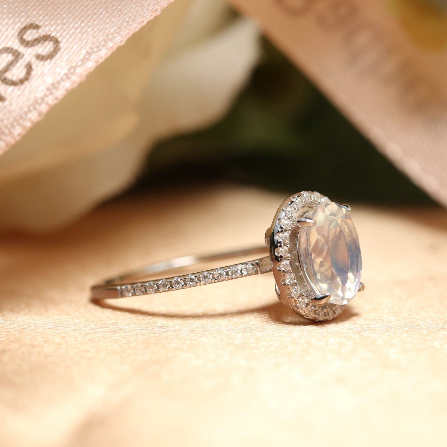 Twist Round Cut Moonstone Engagement Ring from Black Diamonds New York