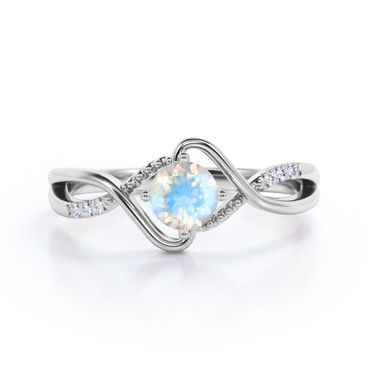 Trendy Twists 0.6 carat Round cut Rainbow Moonstone and diamond infinity pave engagement ring in White gold