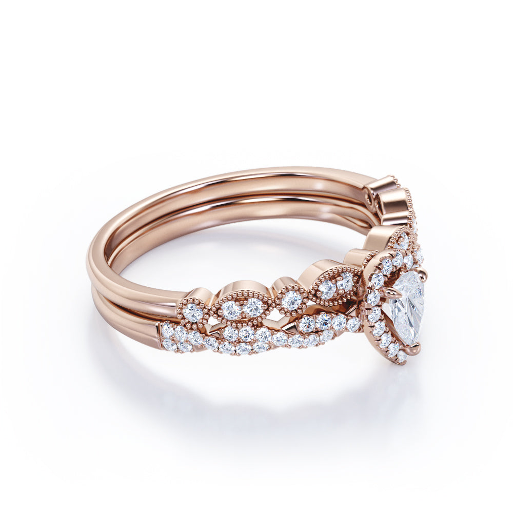 Vintage infinity 1.25 carat Pear shaped Moissanite and diamond milgrain and halo Bridal set in Rose gold