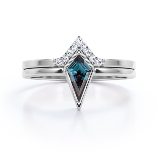 Matching Chevron Bezel 1.15 carat Kite shaped Synthetic Alexandrite and diamond solitaire wedding ring set in White gold