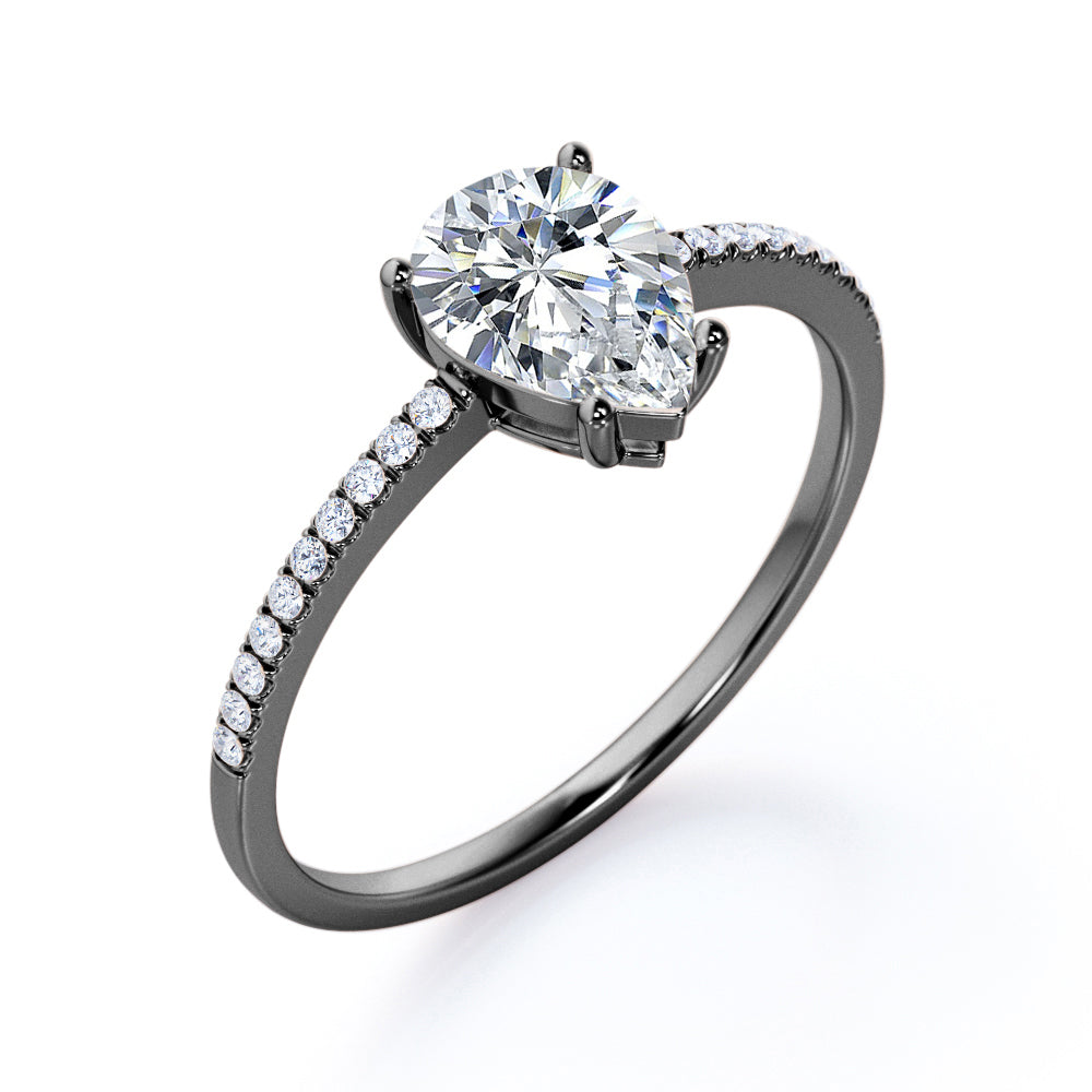 Elegant 1.2 carat Pear shaped Moissanite and diamond vintage prong engagement ring in Black gold