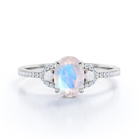 Pretty Pearls 1.5 carat Oval cut Moonstone and diamond traditional engagement ring in White gold