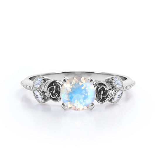 Vintage Rose 1.1 carat Round cut Blue Moonstone and marquise diamond engagement ring in White gold