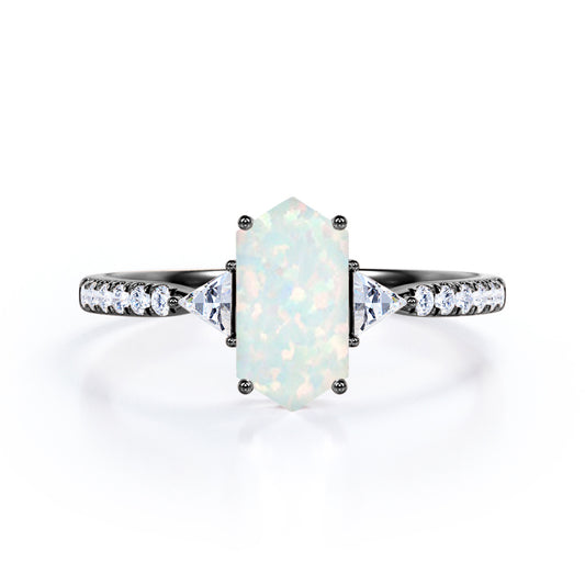 Quadrilateral 3 stone 1.25 carat Hexagon cut Welo Opal and diamond trillion engagement ring in Black gold