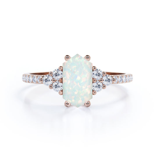 Elongated 1.20 carat Hexagon cut Australian boulder Opal and diamond pave set engagement ring in rose gold