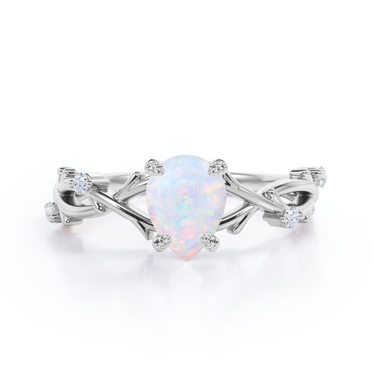 Vintage twig 1 carat Pear cut Ethiopian Opal and diamond forest engagement ring in White gold