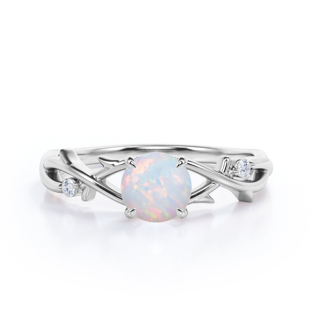Dainty twig 1 carat Round cut Ethiopian Opal and diamond vintage infinity engagement ring in Black gold