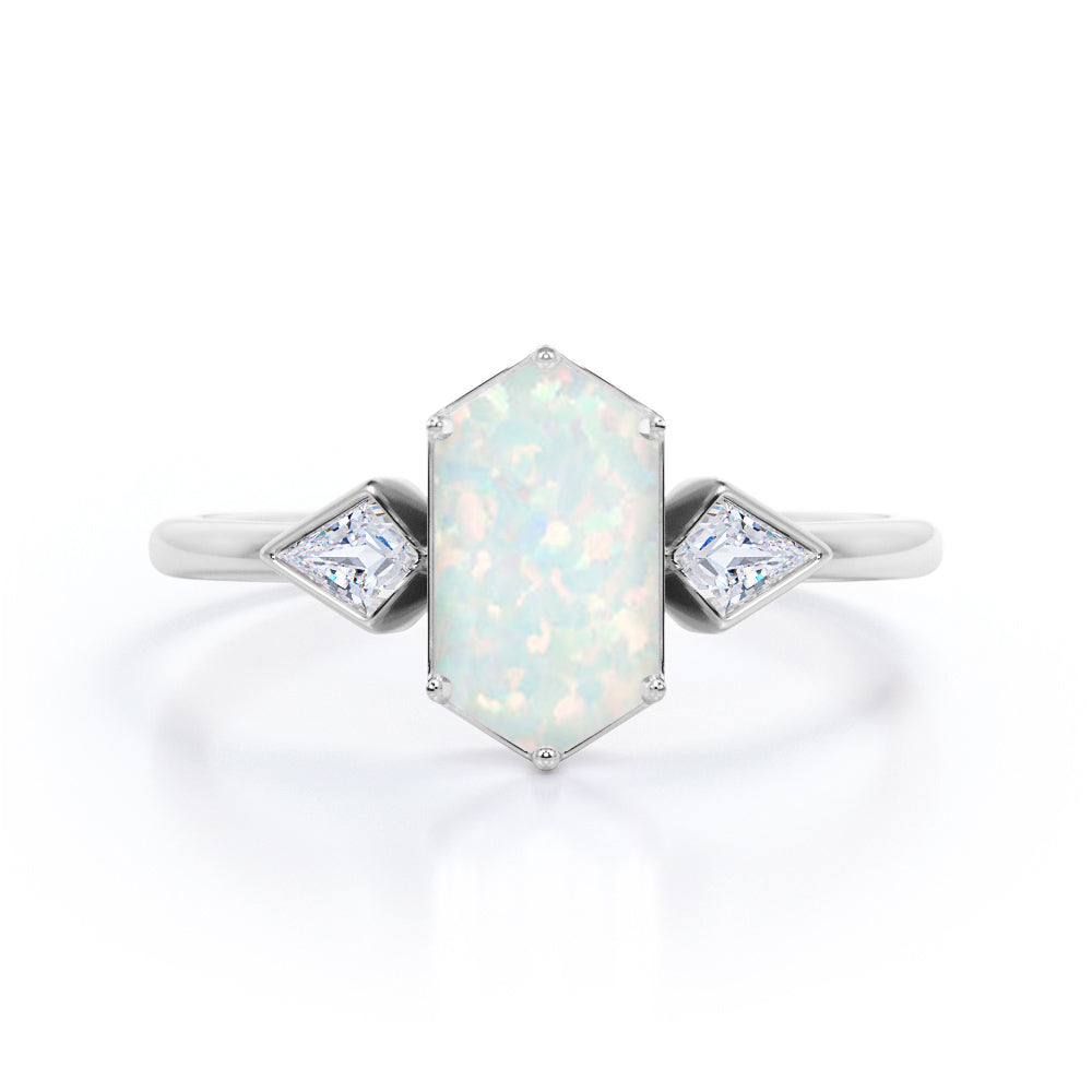 Elongated 1.10 carat Hexagonal Opal and marquise diamond bezel set engagement ring in Black gold