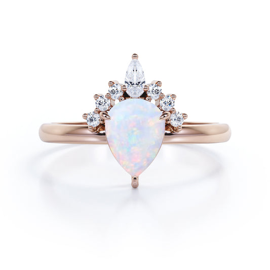 Antique Crown inspired 1.15 carat Pear cut Ethiopian Opal and diamond claw prong setting engagement ring in Rose gold