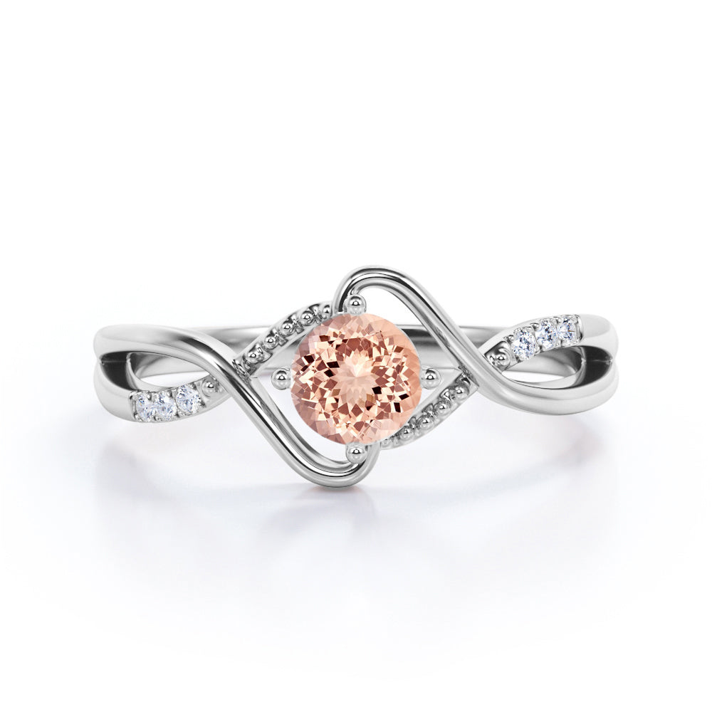 Infinity Twisted 1.15 carat Round cut Morganite and diamond Milgrain anniversary ring for women in Black gold