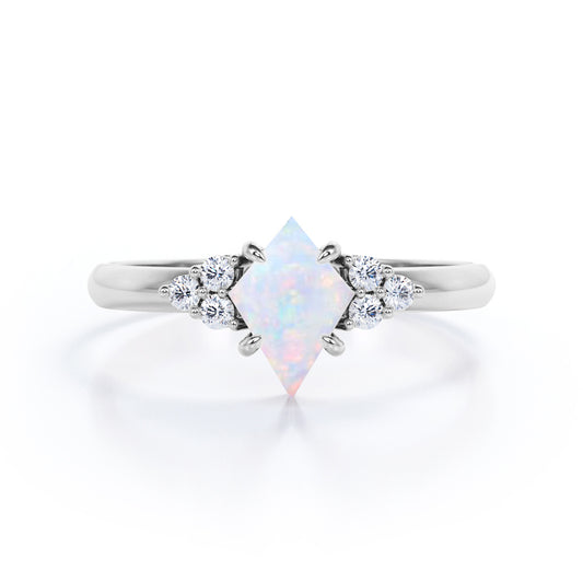 Exquisite Bezel 1.25 carat Kite shaped Australian Opal and diamond seven stone engagement ring in White gold