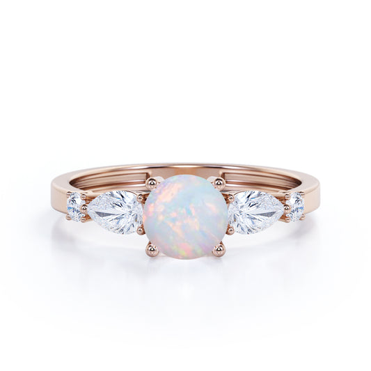 Eccentric 1.25 carat Round cut Ethiopian Opal and marquise and dot diamond engagement ring in Rose gold