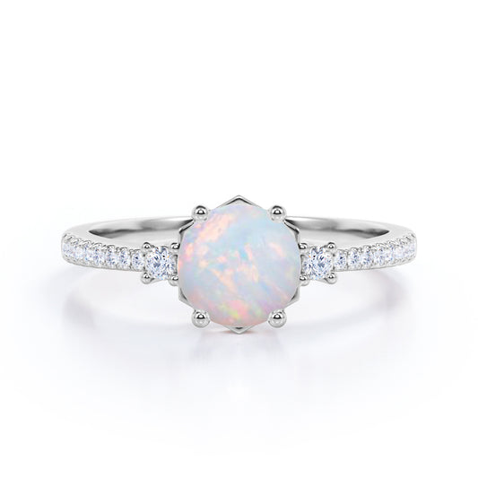 Contemporary 3 stone 1.2 carat Round cut Ethiopian Opal and diamond basket setting low basket setting engagement ring in White gold