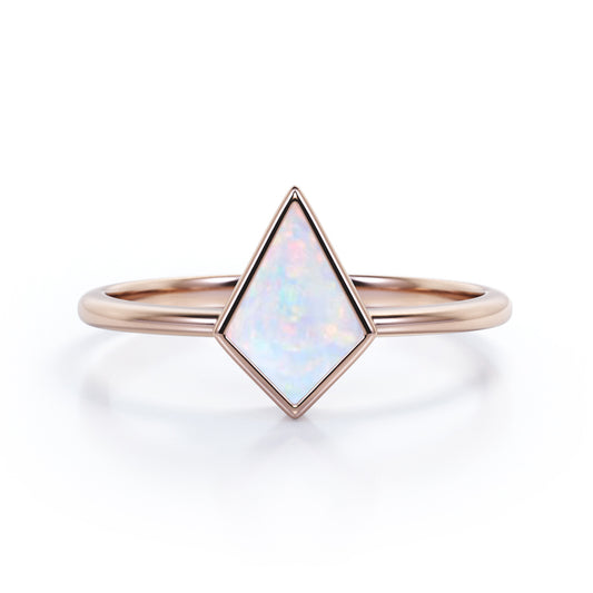 Solitaire Bezel 1 carat Kite shaped Ethiopian Welo Opal tapered shank engagement ring in Rose gold